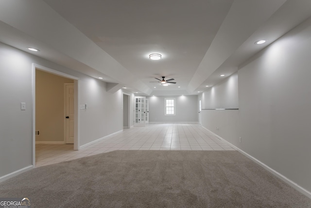 5674 Mountain Cres, Stone Mountain, GA 30087 - empty room with a ceiling fan, light tile patterned floors, light carpet, recessed lighting, and a raised ceiling