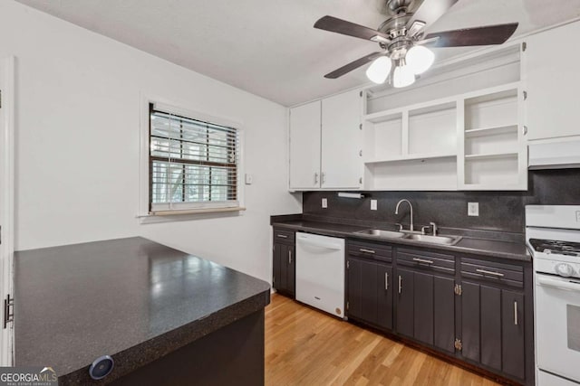 3123 Deshong Dr, Stone Mountain, GA 30087 - kitchen with white appliances, open shelves, dark countertops, and a ceiling fan