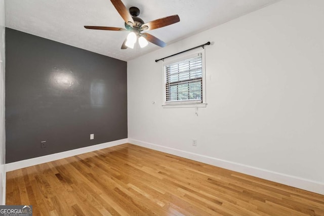 3123 Deshong Dr, Stone Mountain, GA 30087 - spare room with light wood-style flooring and ceiling fan