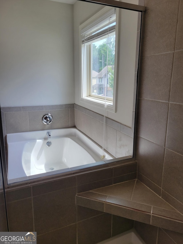 2424 Saint Andrews Rdg, College Park, GA 30337 - bathroom with a garden tub