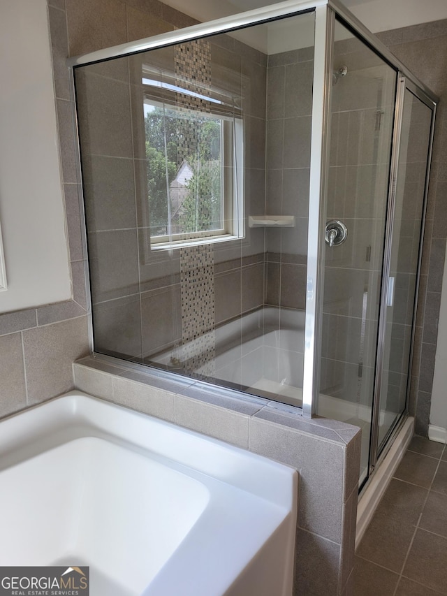 2424 Saint Andrews Rdg, College Park, GA 30337 - full bathroom featuring a shower stall, a bath, and tile patterned flooring