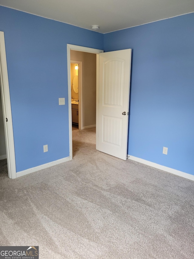 2424 Saint Andrews Rdg, College Park, GA 30337 - unfurnished bedroom featuring carpet and baseboards