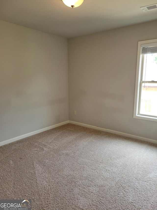 2424 Saint Andrews Rdg, College Park, GA 30337 - empty room with carpet flooring and baseboards