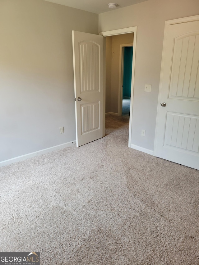 2424 Saint Andrews Rdg, College Park, GA 30337 - unfurnished bedroom with carpet floors and baseboards