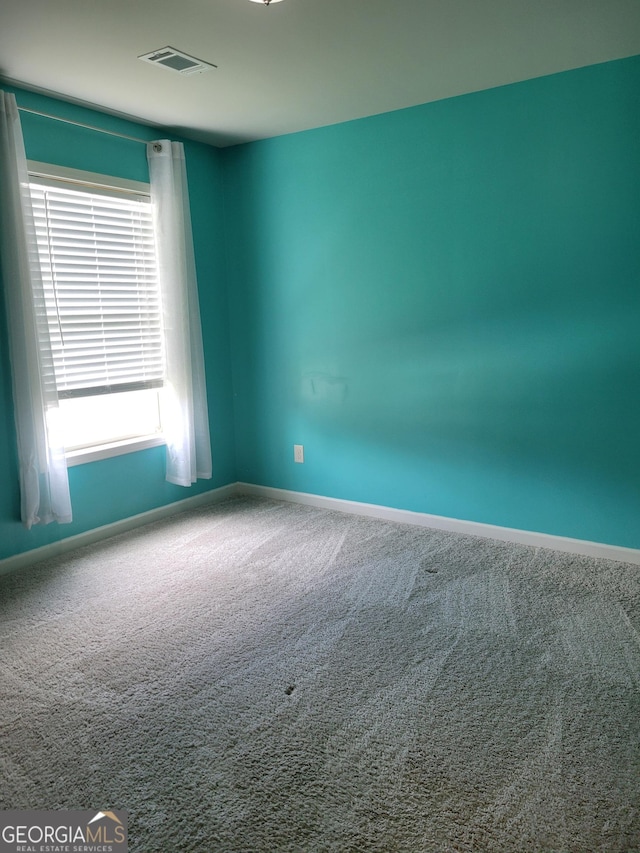 2424 Saint Andrews Rdg, College Park, GA 30337 - empty room with carpet flooring and baseboards