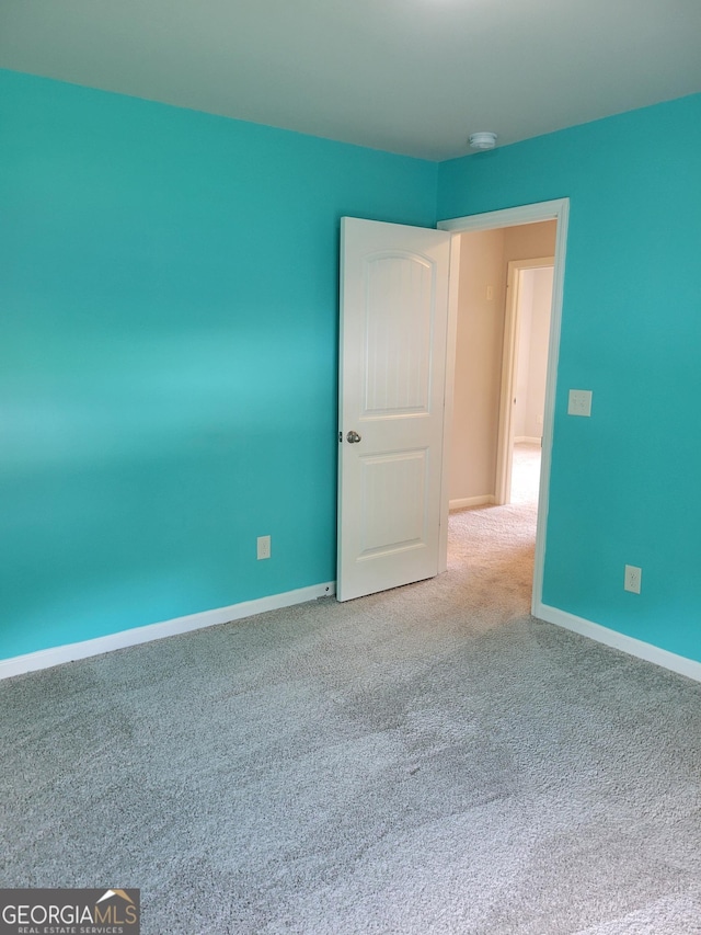 2424 Saint Andrews Rdg, College Park, GA 30337 - carpeted empty room with baseboards and a smoke detector