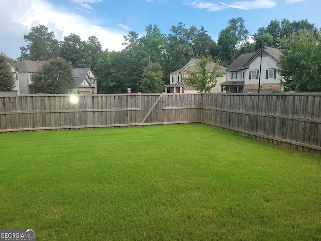 2424 Saint Andrews Rdg, College Park, GA 30337 - fenced backyard featuring a residential view