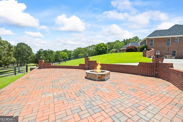 152 Lace Field Ln, Lavonia, GA 30553 - view of patio with an outdoor fire pit and view of scattered trees