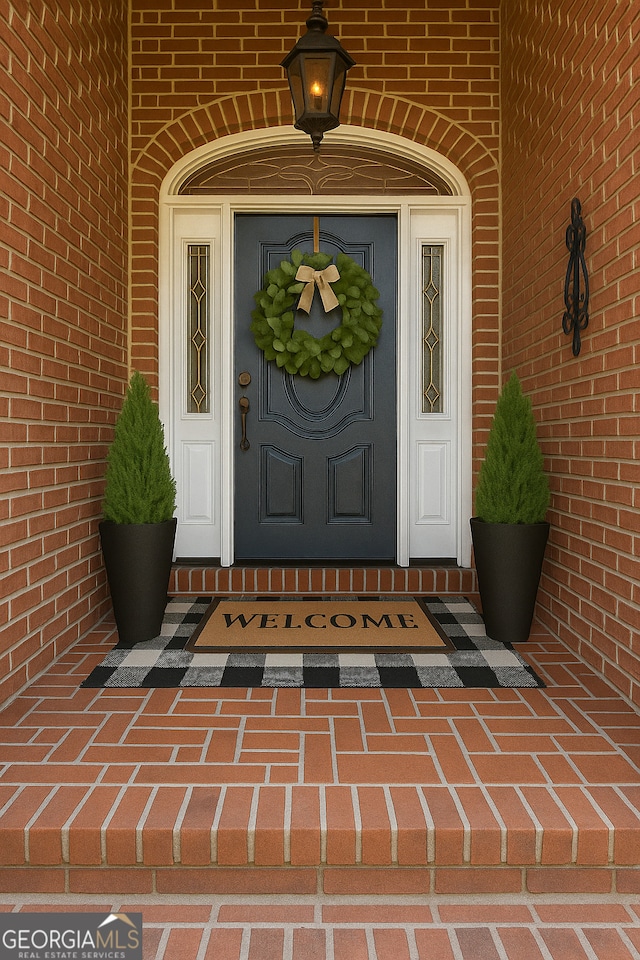 152 Lace Field Ln, Lavonia, GA 30553 - view of exterior entry featuring brick siding