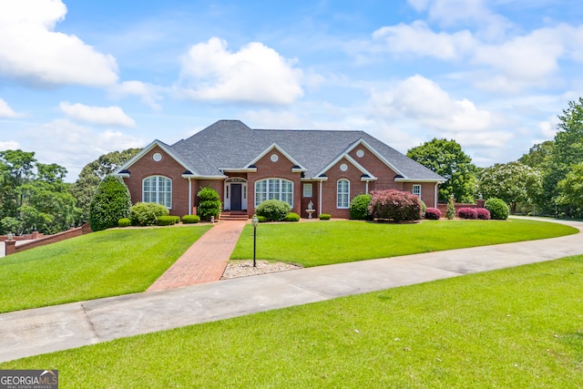 152 Lace Field Ln, Lavonia, GA 30553 - view of front of home with brick siding, a front lawn, and roof with shingles