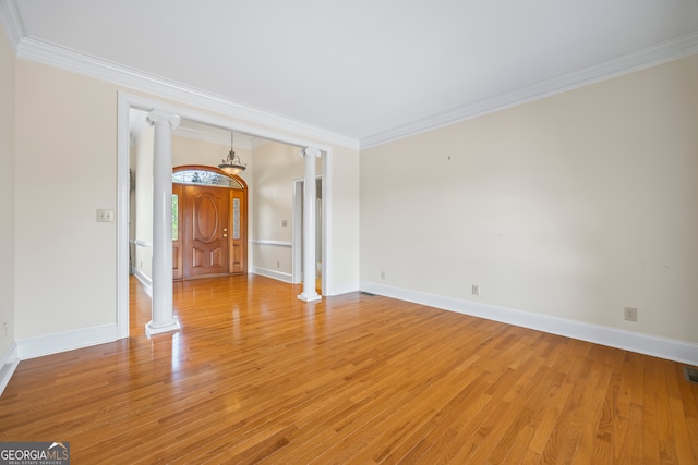 152 Lace Field Ln, Lavonia, GA 30553 - unfurnished room featuring ornate columns, ornamental molding, and light wood finished floors