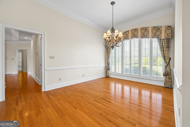 152 Lace Field Ln, Lavonia, GA 30553 - unfurnished room with crown molding, a chandelier, and wood finished floors