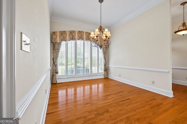 152 Lace Field Ln, Lavonia, GA 30553 - unfurnished room with a chandelier, ornamental molding, and wood finished floors