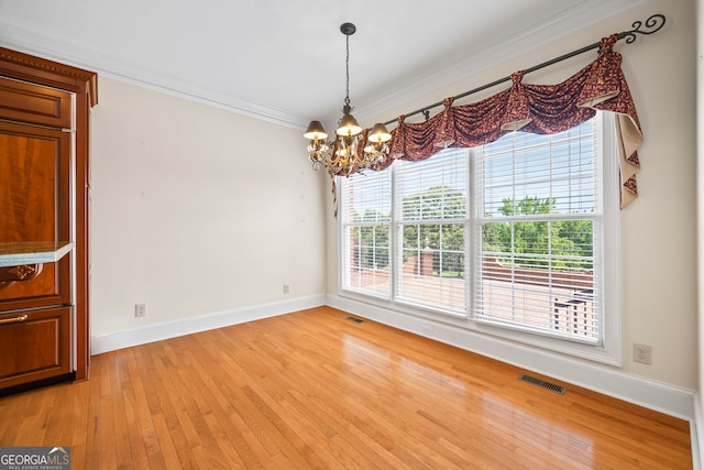 152 Lace Field Ln, Lavonia, GA 30553 - unfurnished room with a chandelier, light wood-style floors, and crown molding