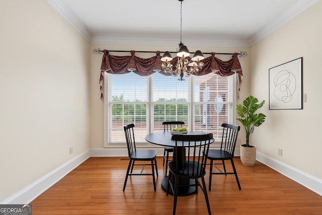 152 Lace Field Ln, Lavonia, GA 30553 - dining room with a chandelier, light wood finished floors, and ornamental molding