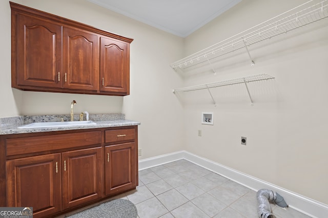 152 Lace Field Ln, Lavonia, GA 30553 - laundry area featuring electric dryer hookup, washer hookup, cabinet space, ornamental molding, and light tile patterned floors