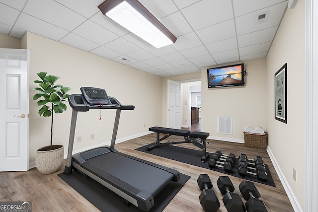 152 Lace Field Ln, Lavonia, GA 30553 - workout area featuring wood finished floors and a paneled ceiling