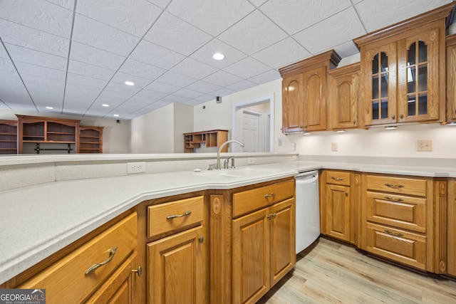 152 Lace Field Ln, Lavonia, GA 30553 - kitchen with dishwasher, light wood-type flooring, brown cabinetry, glass insert cabinets, and recessed lighting