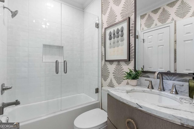 5414 Manteo Inlt, Peachtree Corners, GA 30092 - full bathroom with wallpapered walls, vanity, bath / shower combo with glass door, and crown molding
