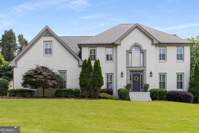5414 Manteo Inlt, Peachtree Corners, GA 30092 - view of front of house with a front yard and brick siding