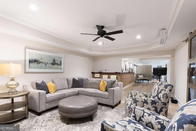 5414 Manteo Inlt, Peachtree Corners, GA 30092 - living room featuring wood finished floors, a raised ceiling, a ceiling fan, recessed lighting, and a wall unit AC