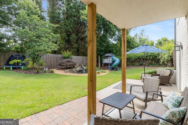 5414 Manteo Inlt, Peachtree Corners, GA 30092 - fenced backyard with a patio area and outdoor lounge area