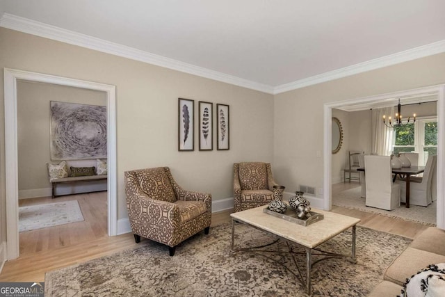 5414 Manteo Inlt, Peachtree Corners, GA 30092 - living room with crown molding, a chandelier, and wood finished floors