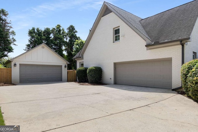 5414 Manteo Inlt, Peachtree Corners, GA 30092 - view of side of home featuring brick siding and a shingled roof