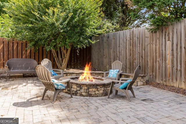 5414 Manteo Inlt, Peachtree Corners, GA 30092 - fenced backyard featuring a fire pit and a patio