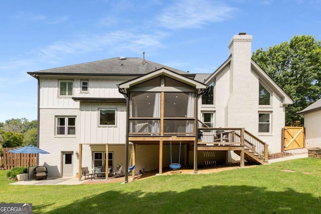 5414 Manteo Inlt, Peachtree Corners, GA 30092 - rear view of house featuring board and batten siding, stairs, a patio, a sunroom, and a deck