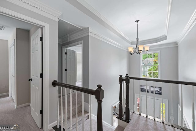 2864 Wyndcliff Ct, Marietta, GA 30066 - corridor featuring an upstairs landing, a chandelier, carpet, ornamental molding, and a raised ceiling