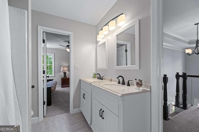 2864 Wyndcliff Ct, Marietta, GA 30066 - ensuite bathroom featuring double vanity, ceiling fan, crown molding, a chandelier, and a shower with curtain