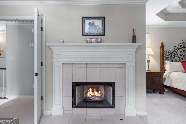 2864 Wyndcliff Ct, Marietta, GA 30066 - bedroom / living area view of a tile fireplace, carpet floors, and crown molding