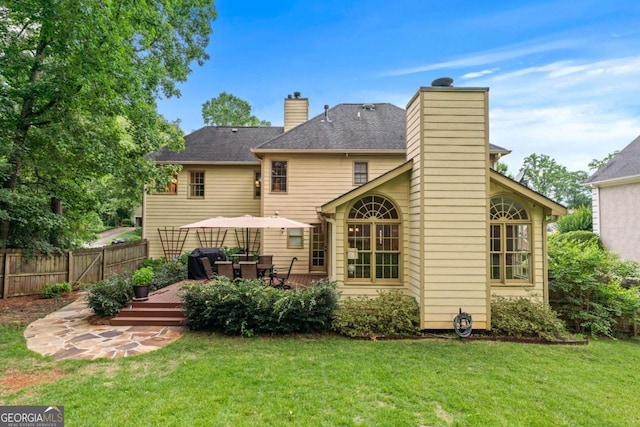 2864 Wyndcliff Ct, Marietta, GA 30066 - back of property with a chimney and a deck