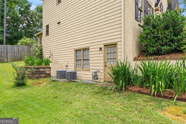 2864 Wyndcliff Ct, Marietta, GA 30066 - view of side of home featuring a central AC unit