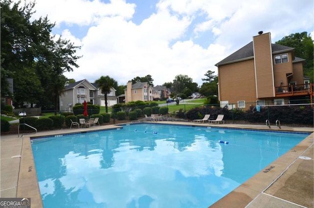 2864 Wyndcliff Ct, Marietta, GA 30066 - community pool featuring a residential view