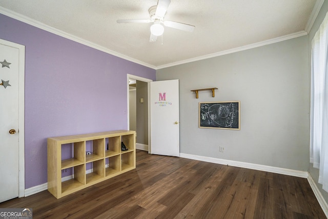 1083 Hampton Rd, Hampton, GA 30228 - empty room featuring a ceiling fan, wood finished floors, and crown molding