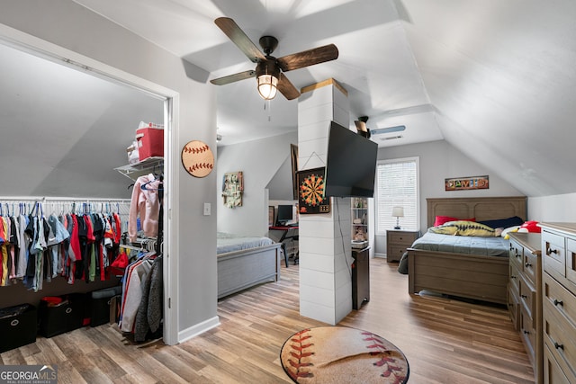 1436 Virginia Way, Monroe, GA 30655 - bedroom featuring lofted ceiling, light wood-type flooring, and a ceiling fan