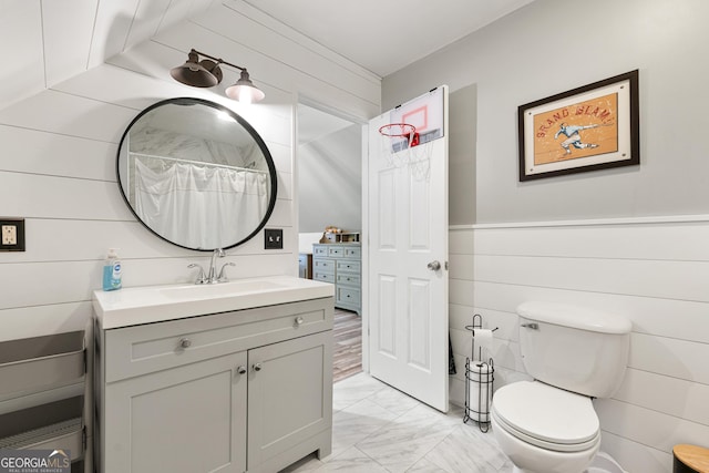 1436 Virginia Way, Monroe, GA 30655 - full bathroom with marble finish flooring, vanity, and wooden walls