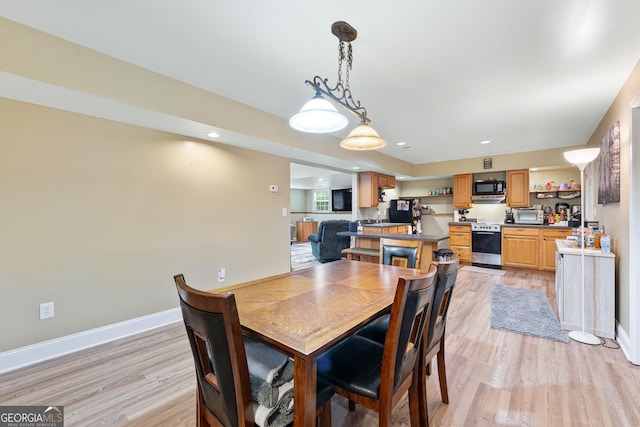 1436 Virginia Way, Monroe, GA 30655 - dining room with light wood-style flooring and recessed lighting