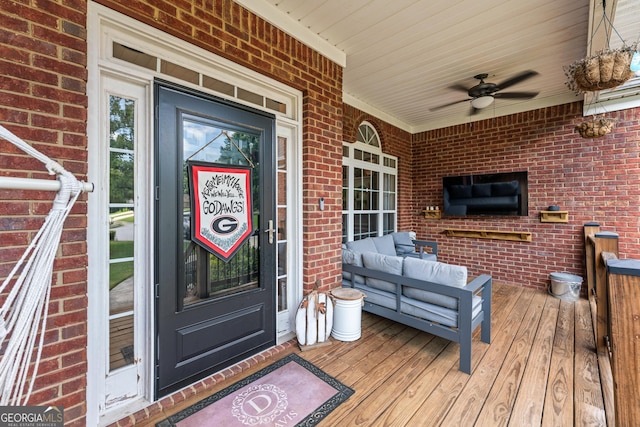 1436 Virginia Way, Monroe, GA 30655 - doorway to property with brick siding, an outdoor living space, ceiling fan, and a porch