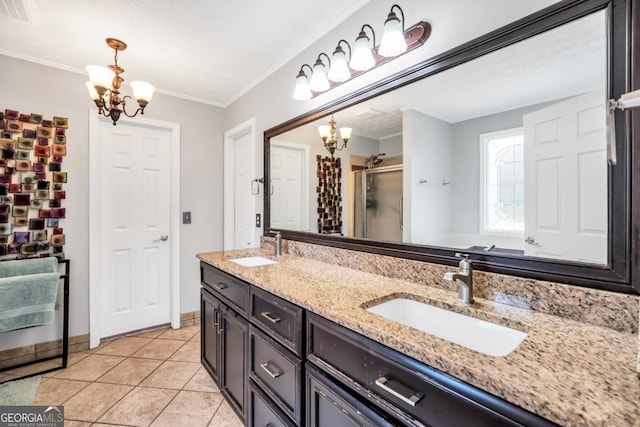 186 Ashley Dr, Mcdonough, GA 30252 - bathroom featuring a chandelier, double vanity, a stall shower, tile patterned floors, and crown molding