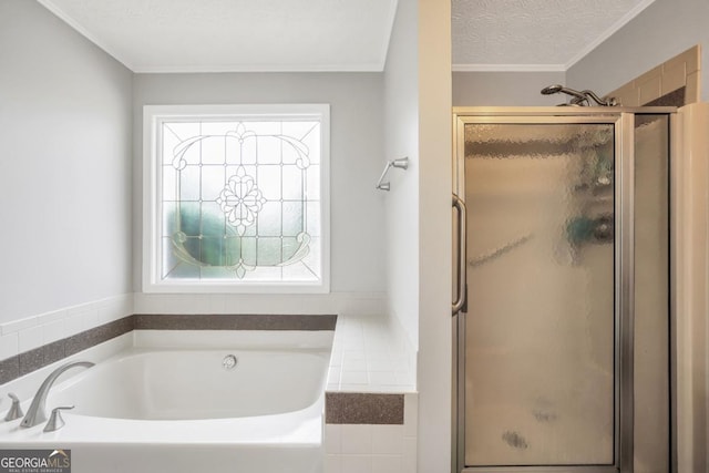 186 Ashley Dr, Mcdonough, GA 30252 - full bathroom featuring a stall shower, a garden tub, ornamental molding, and a textured ceiling