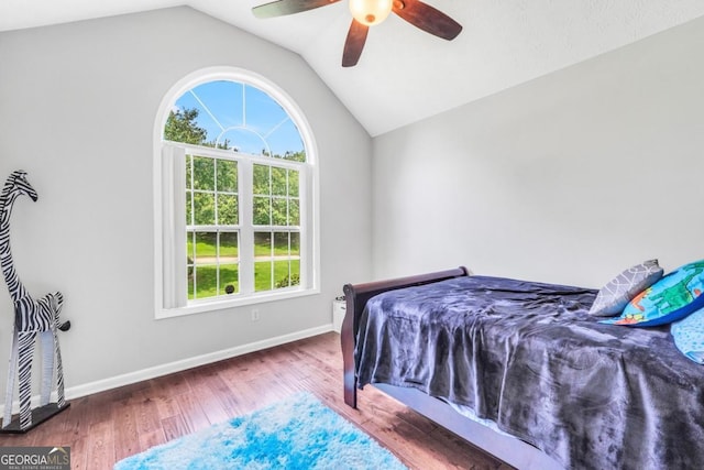 186 Ashley Dr, Mcdonough, GA 30252 - bedroom featuring vaulted ceiling, wood finished floors, and ceiling fan