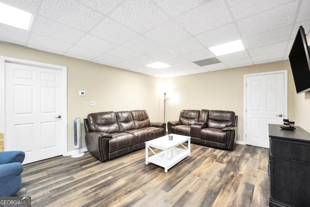 186 Ashley Dr, Mcdonough, GA 30252 - living area featuring wood finished floors and a paneled ceiling