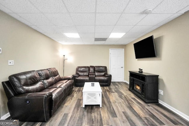 186 Ashley Dr, Mcdonough, GA 30252 - living room with a paneled ceiling and wood finished floors