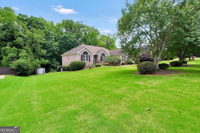 186 Ashley Dr, Mcdonough, GA 30252 - single story home with a storage unit