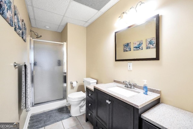 186 Ashley Dr, Mcdonough, GA 30252 - full bath featuring vanity, a stall shower, tile patterned flooring, and a drop ceiling