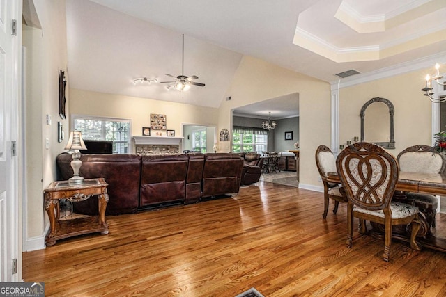 4110 Summit Chase, Gainesville, GA 30506 - living room featuring a chandelier, light wood finished floors, ceiling fan, ornamental molding, and vaulted ceiling
