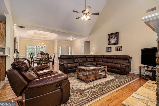 4110 Summit Chase, Gainesville, GA 30506 - living room featuring a chandelier, a ceiling fan, wood finished floors, lofted ceiling, and crown molding